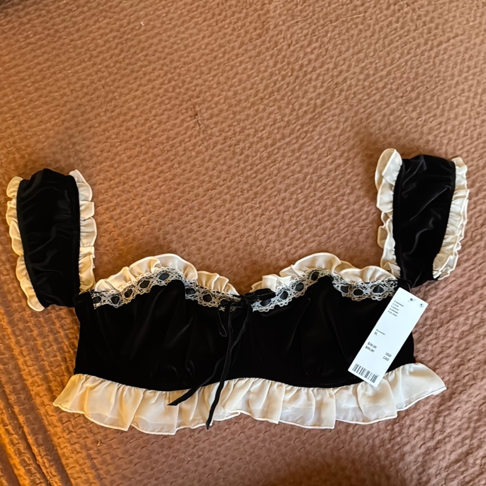 Chic Black and Cream Ruffled Top